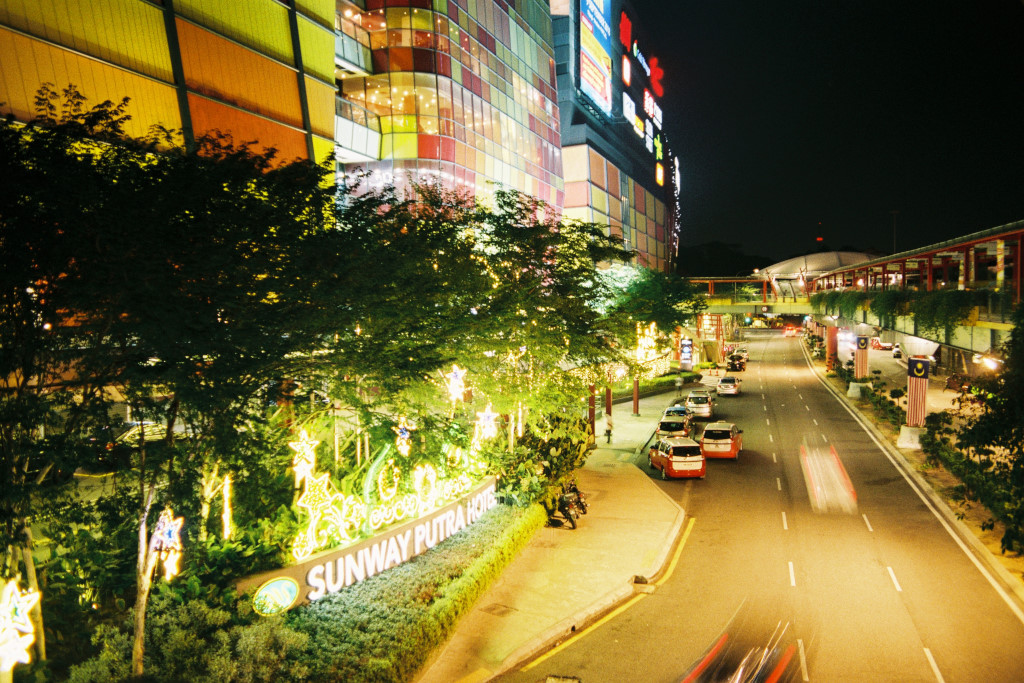 Sunway Putra mall by night, with taxis